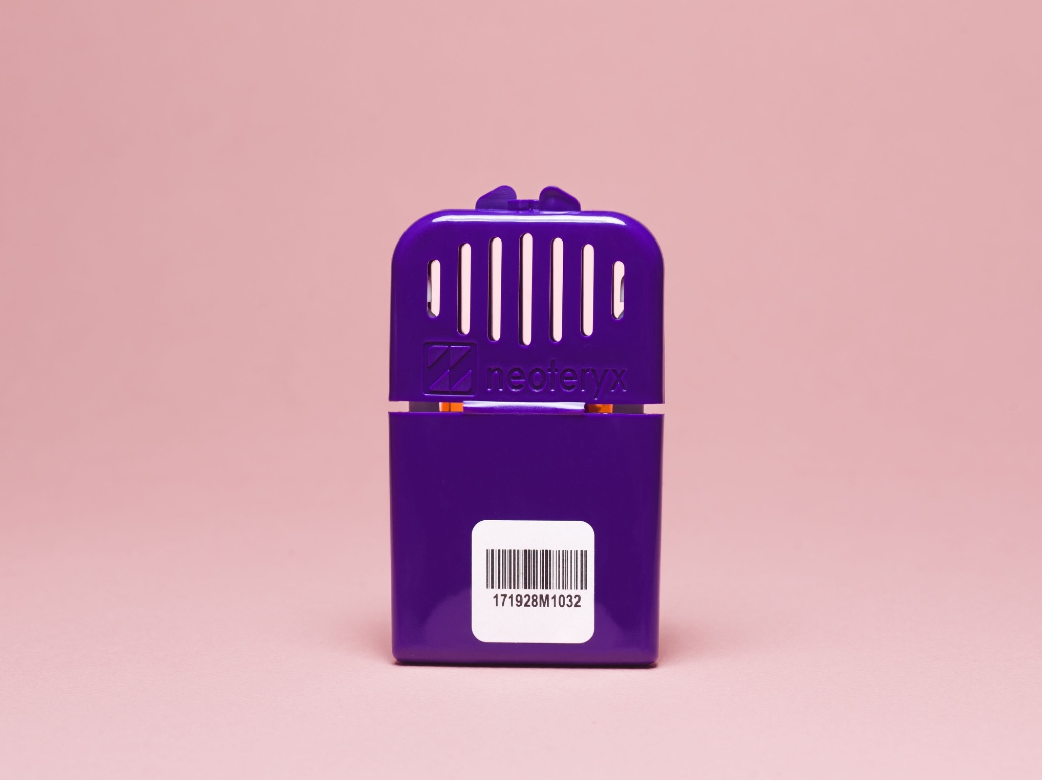 Purple PreTRM sample device isolated on a blush pink background