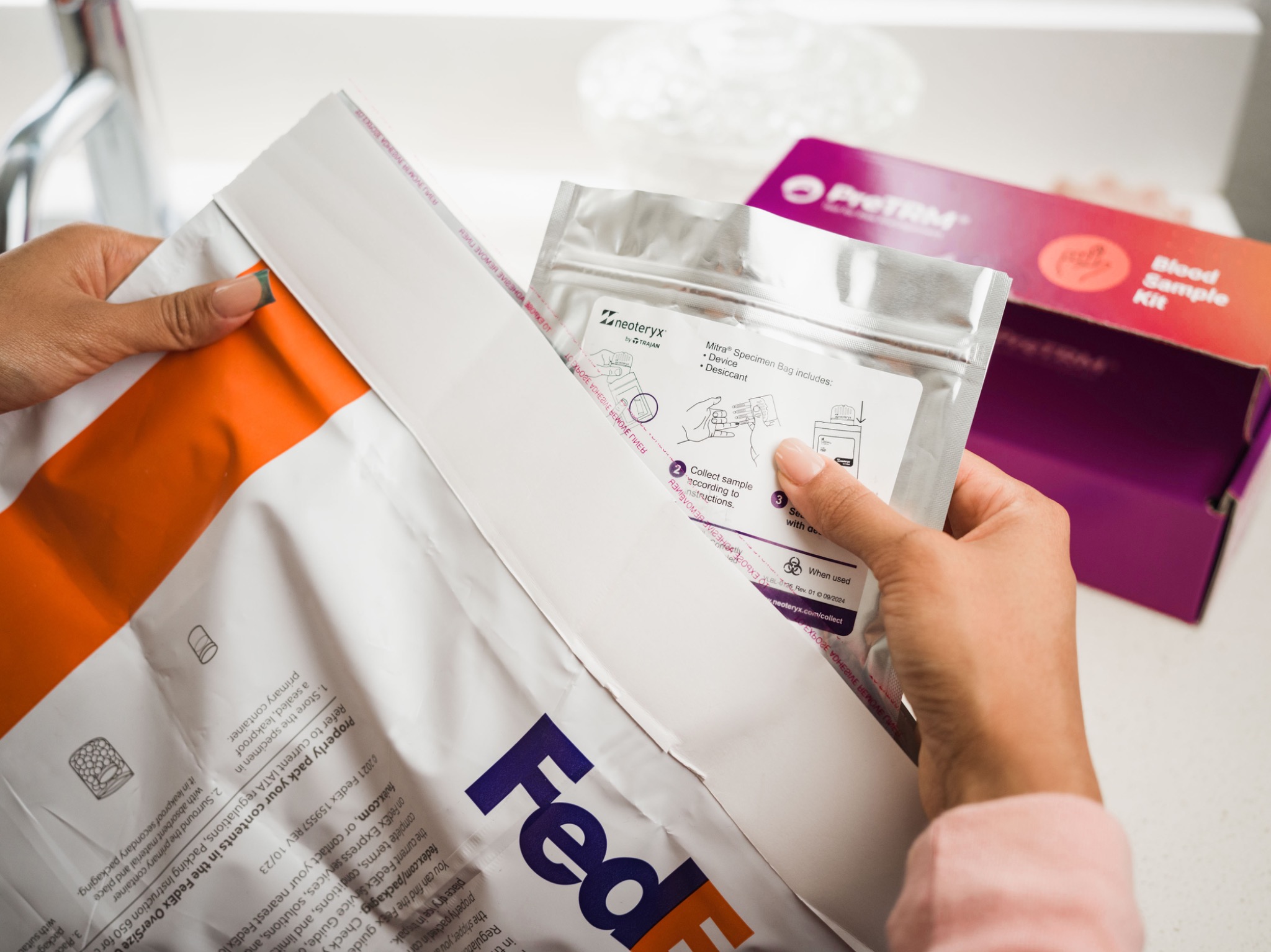 FedEx return mailer, sample pouch and PreTRM package arranged together